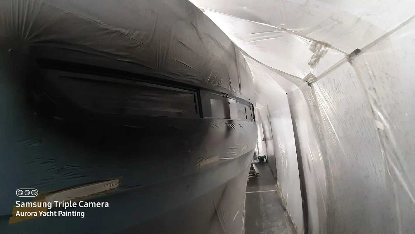 Zeelander yacht spot repair masking — Aurora Yacht Painting
