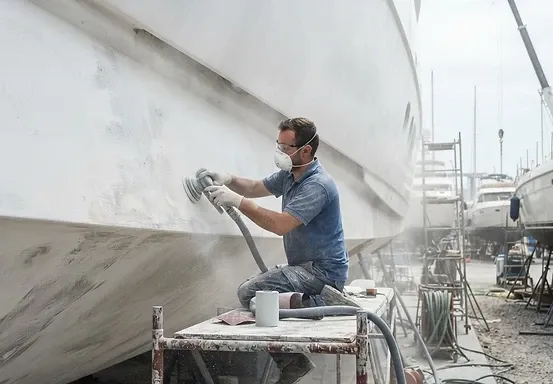 Composite hull surface sanding — Aurora Yacht Painting